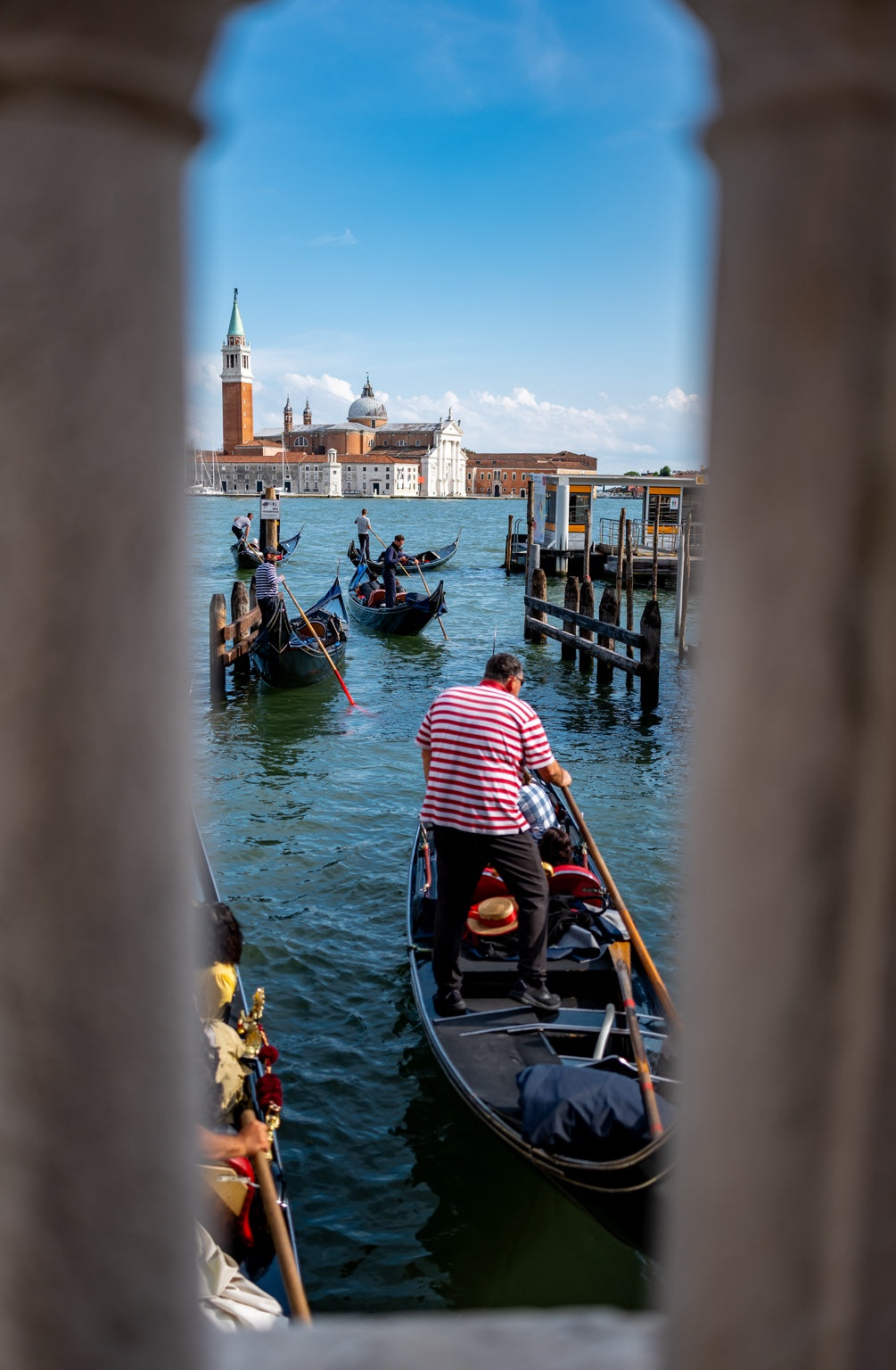 A gondolier on the Venetian waterfront