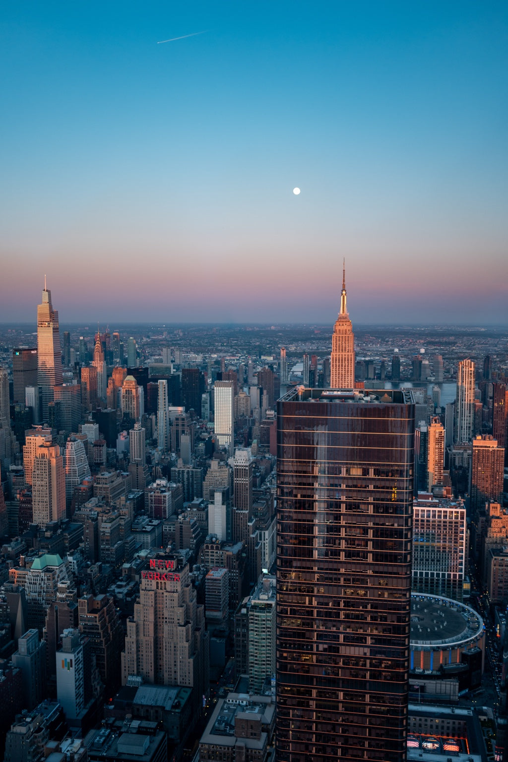 The moon above the Empire State Building