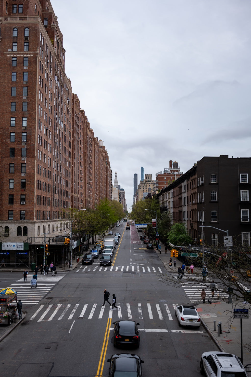 A New York street beneath a cloudy sky