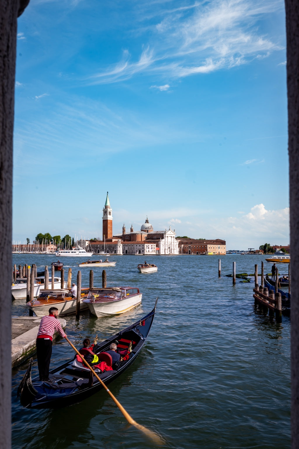 Gondola on the Venetian lagoon with San Giorgio Maggiore beyond