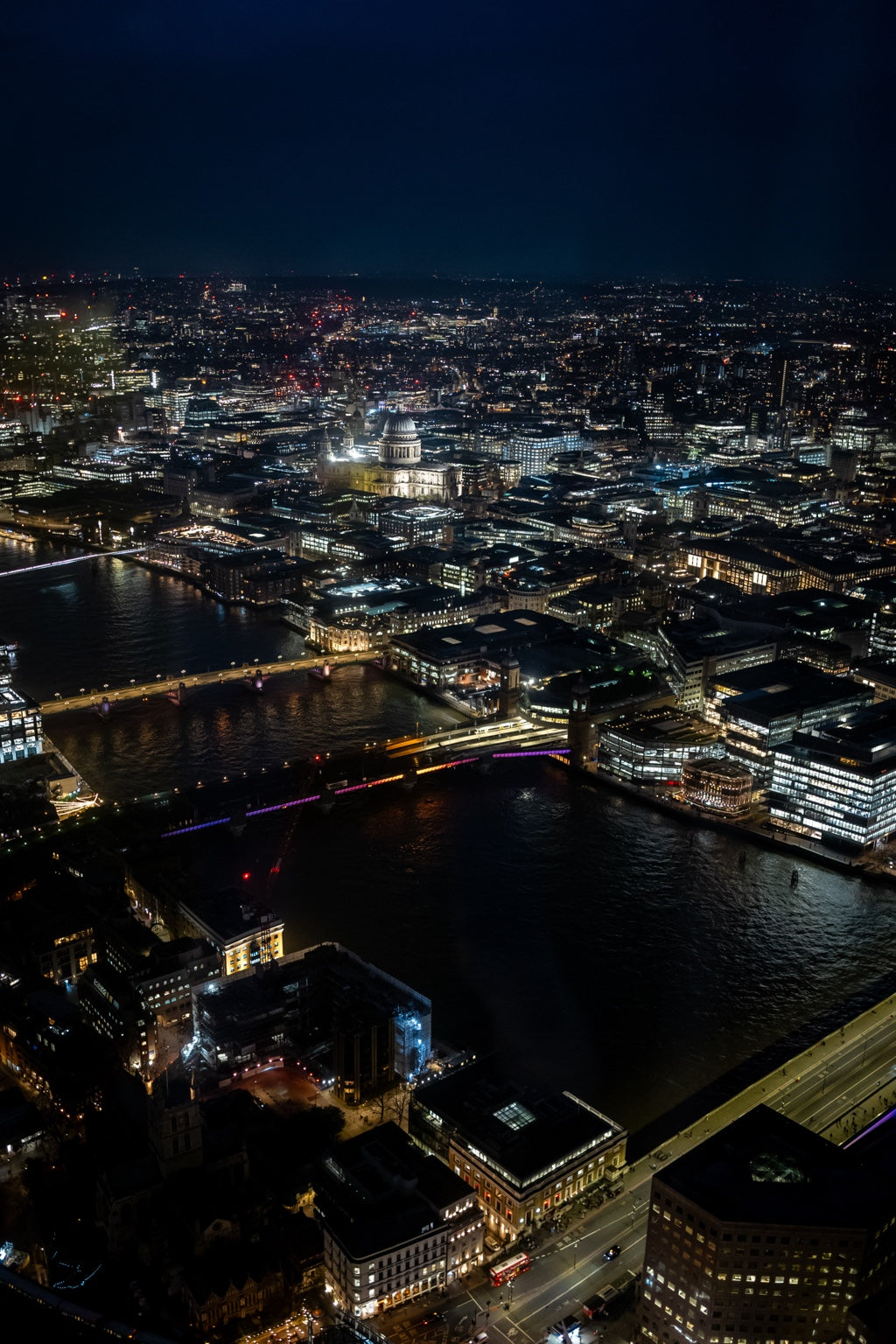 London rooftops and lights at night
