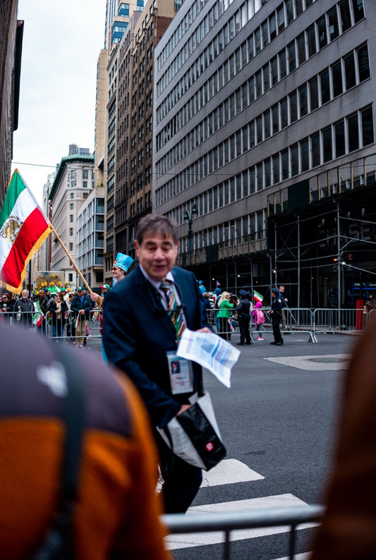 People and flags at a New York street parade